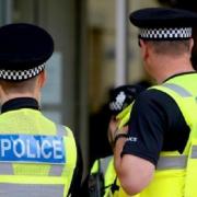 A Worcestershire woman has been arrested by police investigating the murder of a 48-year-old man from Cardiff.