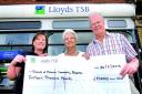 GENEROSITY: Lloyds TSB manager Helen Sebbage, left, hands over a cheque for £15,000 from a mystery donor to Gerry and Alan Stevens from the Friends of Malvern Community Hospital towards their Ease The Pain appeal. 3513393001.
