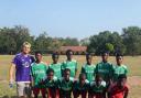 Sean Paddock (far left) with Shark FC out in Ghana.