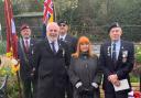 Cllr Martin Allen, Cllr Natalie McVey and veteran Peter Ferroni at the ceremony with two standard bearers