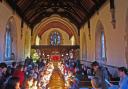 BEST BEHAVIOUR: Children celebrate Christingle at Crowle, near Worcester. Photograph by Bob Brierley