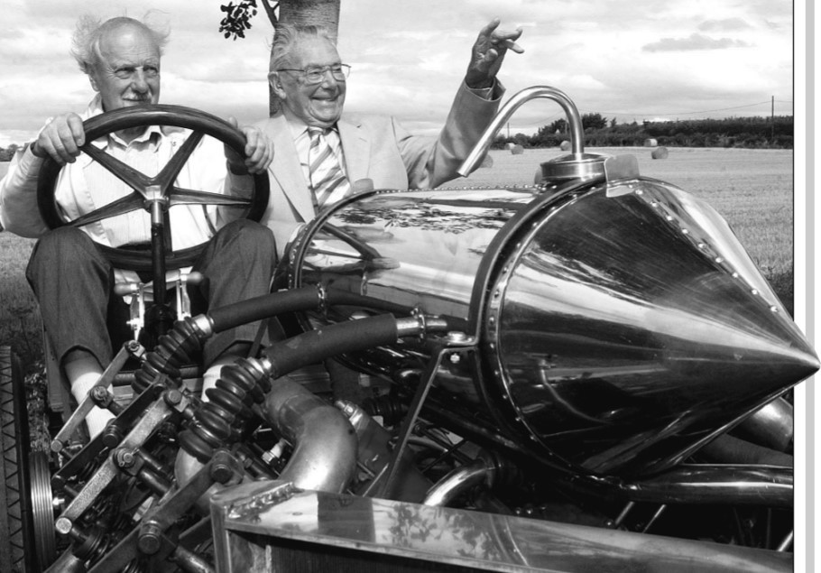 Norman Thomas, right, beside DarracQ V8 owner Gerald Firkins. Norman was celebrating his 100th birthday in August 2005, having been born in the same year the car, broke the land speed record in its heyday, was built