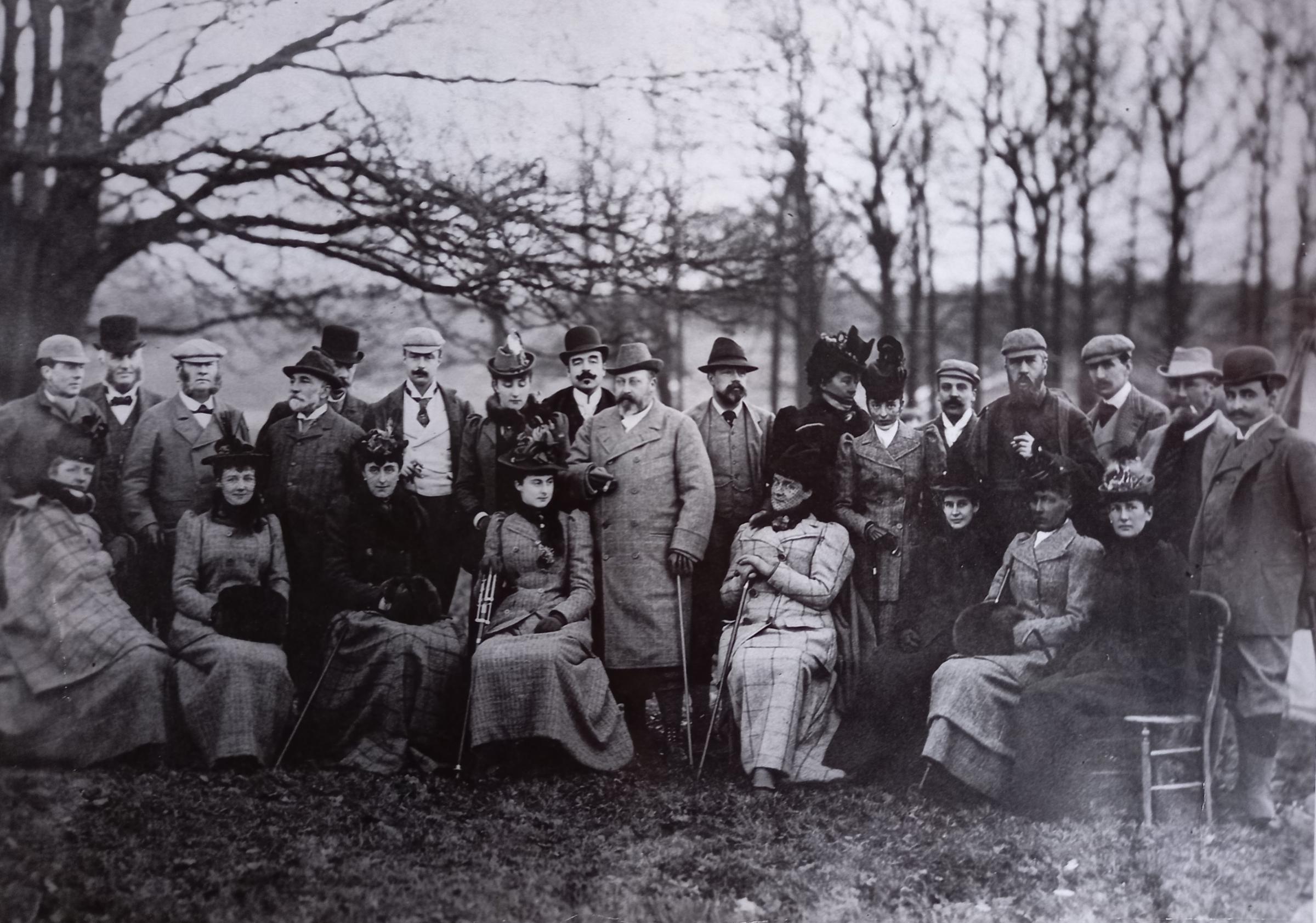 A royal shooting party in the deer park of Witley Court in December 1892. The Prince of Wales stands in the centre and to his left are the 2nd Earl of Dudley and his first wife Rachel