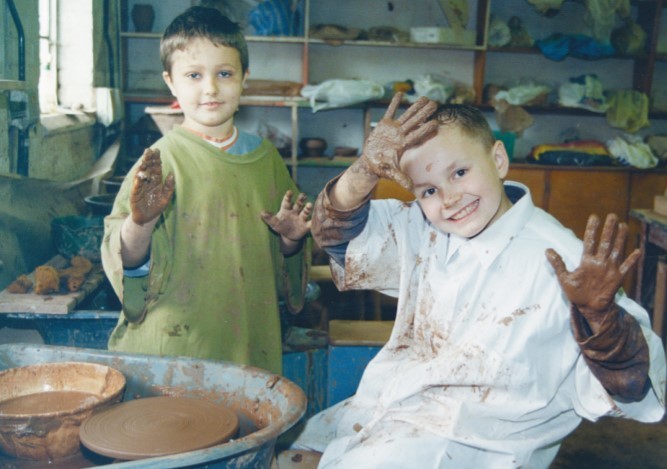 Callum Chaplain (left) and Craig Newman try their hand at the potter’s wheel during a holiday course at Malvern Hills College