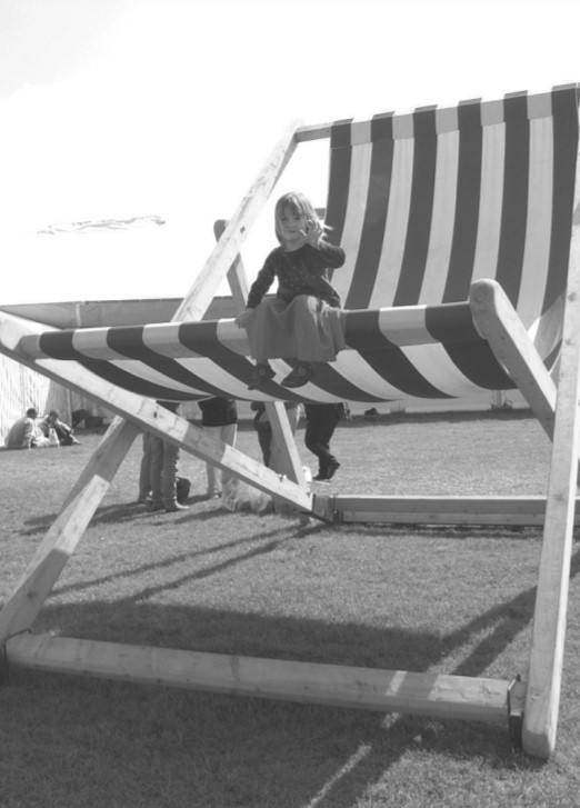 Emily Hutchinson tries out a deckchair sculpture at the Spring Gardening Show in 2002