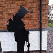 Dedication of Standing Soldier statue at village hall
