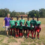 Sean Paddock (far left) with Shark FC out in Ghana.
