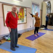 92-year-old yogi Robin Goswell and instructor Allison Maxwell