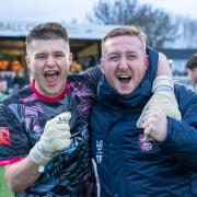 Josh Bishop (left), who was named supporters' player of the season, pictured with goalkeeping coach Tom Fairclough (right)