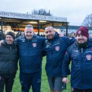 Co-managers Stephen Cleal (centre right) and Lee Hooper (far right), as well as first-team coach Andy Bevan (far left), have signed on for another season at the Hillsiders