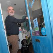 4714757001. 18/11/14. Sean Austin who owns Austin & Co on Belle Vue Terrace, Malvern and his dog Nessa. The shop has been awarded 'Most Dog Friendly' in a national competition. Picture by Nick Toogood. (13054824)