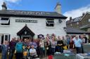 The community turned out in force to clean the pub last October