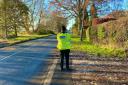 A police officer carries out a speed check