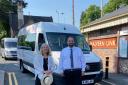 MP Harriett Baldwin and county transport chief Mike Rouse with a new on-demand bus