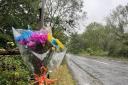 Flowers have been left at the roadside following the crash