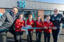 Co-op store manager Andrew Lane, pupils Molly, Max, Megan and Tyler from St Matthias Primary School and Co-op member pioneer Tina Palmer
