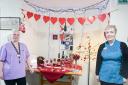 Vanda Jenkins and Dawn Barnes with their Valentine’s display at Perrins House