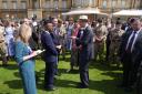 The Duke of Edinburgh greets Gold Award holders and members of their families (Jordan Pettitt/PA)