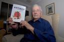 3514685601. 27/08/14. Fred Seiker with a copy of his book 'Lest We Forget' that has been published in Mandarin. Picture by Nick Toogood. (9741559)