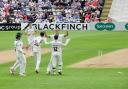 Action from day one of Worcestershire's Domestic First Class Multi Day match against Australia at New Road, Worcester.....Adam Finch celebrates with his Worcestershire team mates after bowling Marcus Harris for 14...Pic Jonathan Barry 7.8.19.