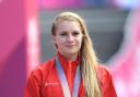 England's Evie Richards with her silver medal after the Women's Cross-country at the Nerang Mountain Bike Trails during day eight of the 2018 Commonwealth Games in the Gold Coast, Australia. PRESS ASSOCIATION Photo. Picture date: Thursday April