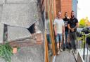 Three men helped the London House Café repair damages to their steps after a recent incident of vandalism.