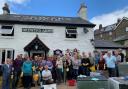 The community turned out in force to clean the pub last October