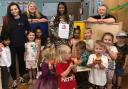 Staff and children at the nursery celebrate their award