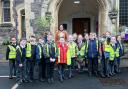 Maricel Biringquez, Davenham’s unit manager, with pupils from Somers Park Primary School.