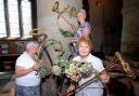 FLORAL: Sandra Starkey, Ann Oldfield and Christine Peer prepare for the event at Great Malvern Priory. 2813356301