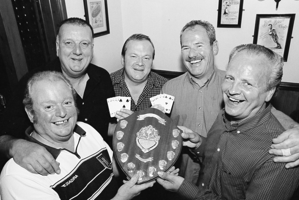 Malvern Town FC crib team Robert Bethell, Dave Smith, Gerry Deegan, Vince Wanklin and Michael Evans show off their trophy after winning the annual Express Inn charity event in 2002