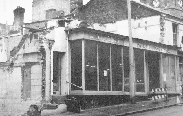 Work goes on in 1977 to remove what was described as “Malvern’s worst eyesore of recent years – the bank of disused shops in front of and above Cecilia Hall in Church Street”