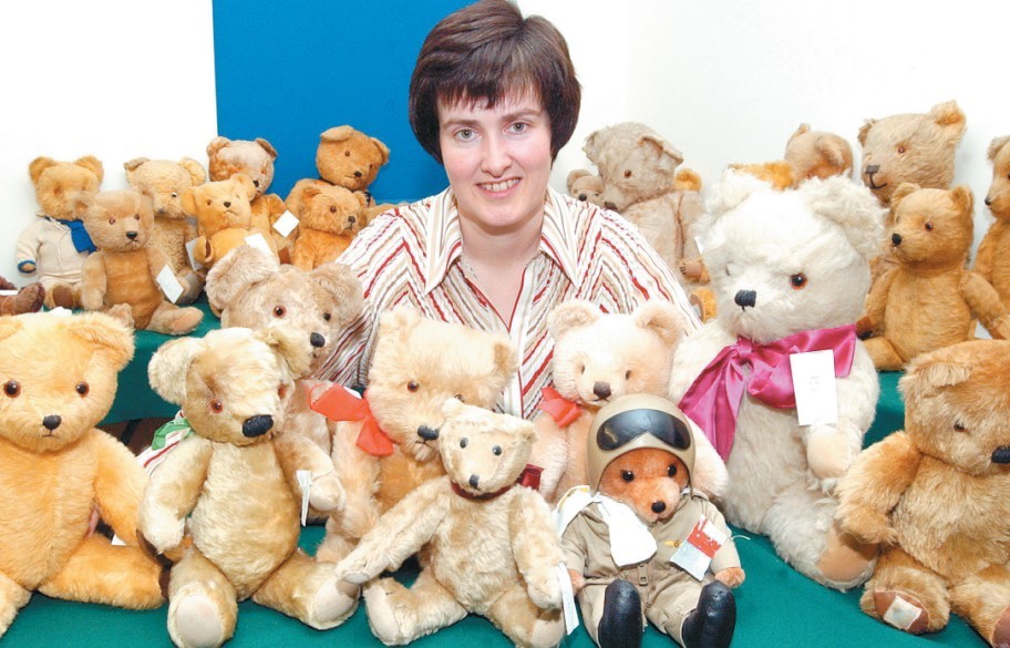 Helen Hitching, from the Malvern Auction Centre, with some of the 60 bears given by an anonymous donor to be sold to raise money to help relatives of those killed in the Boxing Day tsunami in 2005