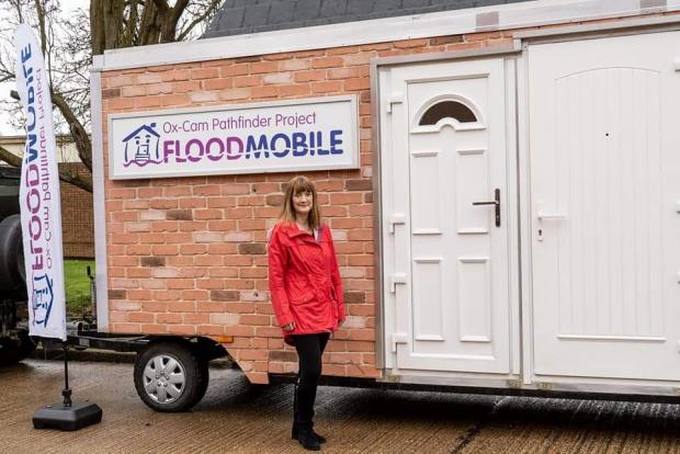 Malvern Gazette: QUICK: Mary Long-Dhonau at the flood mobile. Her actions helped save a man's life after he suffered a heart attack.