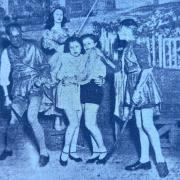 Not sure what’s going on here, but I bet these two young ladies wish they hadn’t tried to sneak into a production in the 1920s without paying!