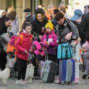 HELP: Refugees trying to flee Ukraine. Pic. AP