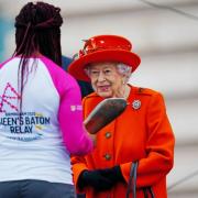 The Queen and Paralympian Kadeena Cox get the baton relay up and running
