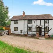 The detached property is timber framed and Grade II listed