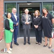 Barchester regional director Xin Zhao, Barchester CEO Pete Calveley, mayor Clive Hooper, Barchester managing director Angela Bradford and Elgar Court general manager Sarah Cadwallader