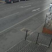 CCTV shows a man walking away from the shop after the attack