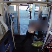 CCTV shows Domonique kicking a thief out of her shop