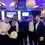 The Cottage in the Wood team celebrate at the awards