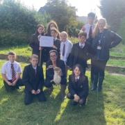 Teacher Betty Barker, Dyson Perrins pupils and one of their ducks