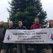 Ryan Pearce from Leigh Sinton Christmas Trees, Andy Box and Laura Morgan from ALB Electrical Services, and Grahame Gibbins and Lyndsey Davies from Malvern Town Council