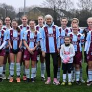 Malvern Town women line up with sponsor Beverley Nielsen