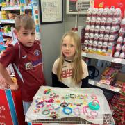 Jessica and Archie Innes at the bracelet selling stall