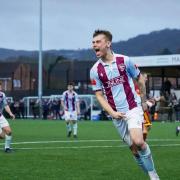 Jack Watts was the provider of both Malvern Town's goals on Monday