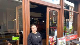 FRUSTRATION: Carmen Prodan, supervisor at Coffee Warehouse in The Foregate says the water leak at the Shaw Street/Foregate Street junction is hurting the business