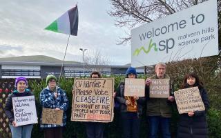 Protesters outside West Worcestershire MP Harriet Baldwin's offices.
